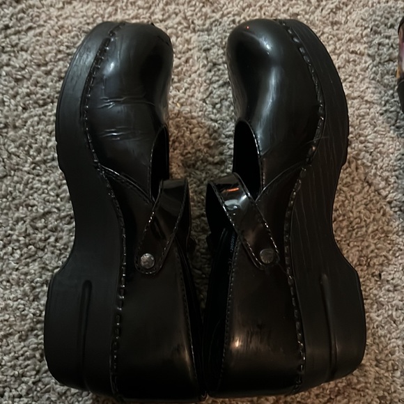 Two pairs of Dansko shoes one pair of Mary Jane the other are multi colored. - Picture 7 of 8